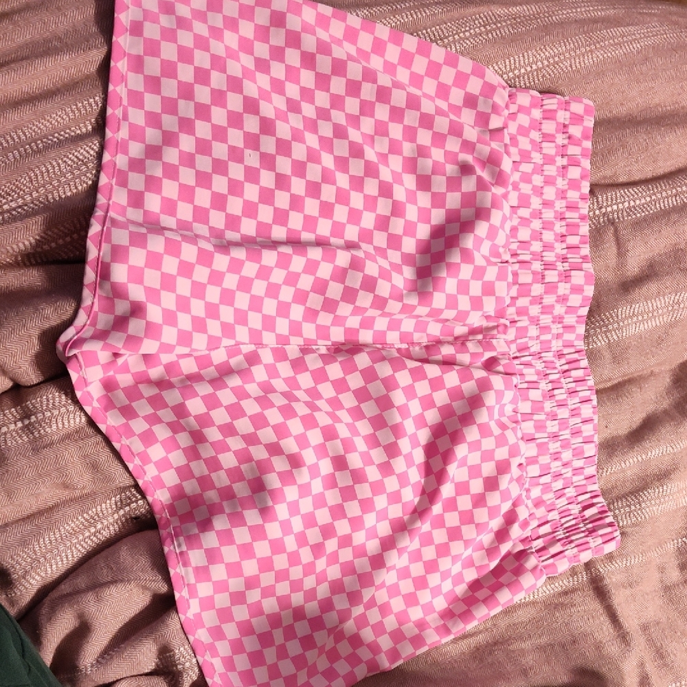 Stylish Pink Checkered Shorts With An Elastic Waistband. Very Athletic Or Casual